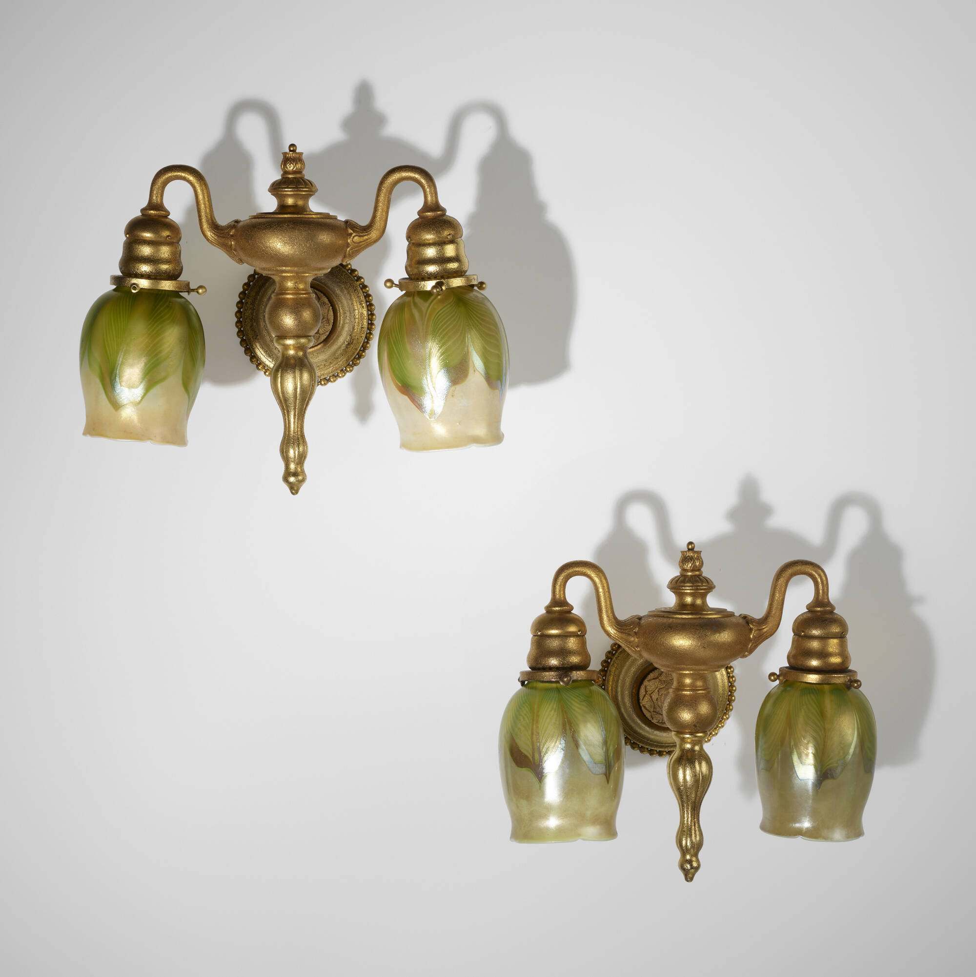 112 TIFFANY STUDIOS Sconces with pulled feather tulip shades pair Art Nouveau Art Deco Glass Lighting 21 March 2024 Auctions Toomey Co. Auctioneers