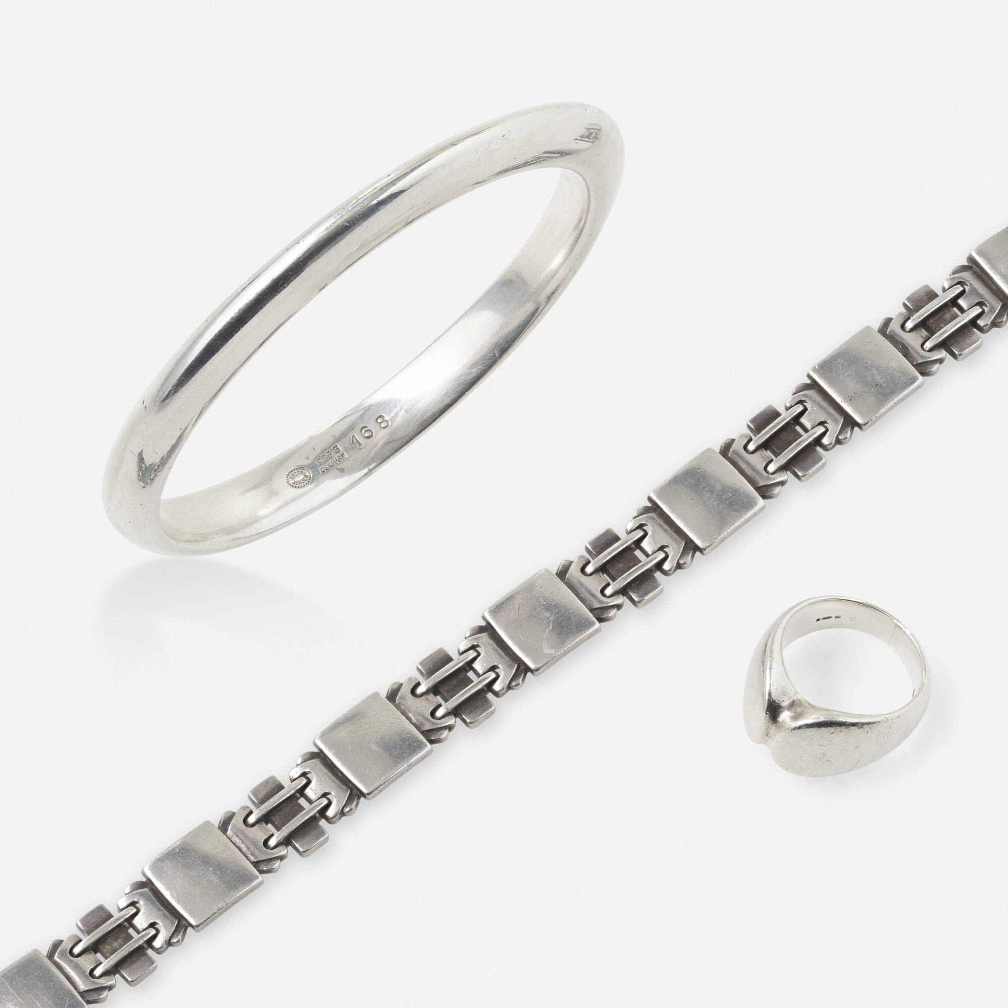 133 GEORG JENSEN Group of modernist sterling silver jewelry