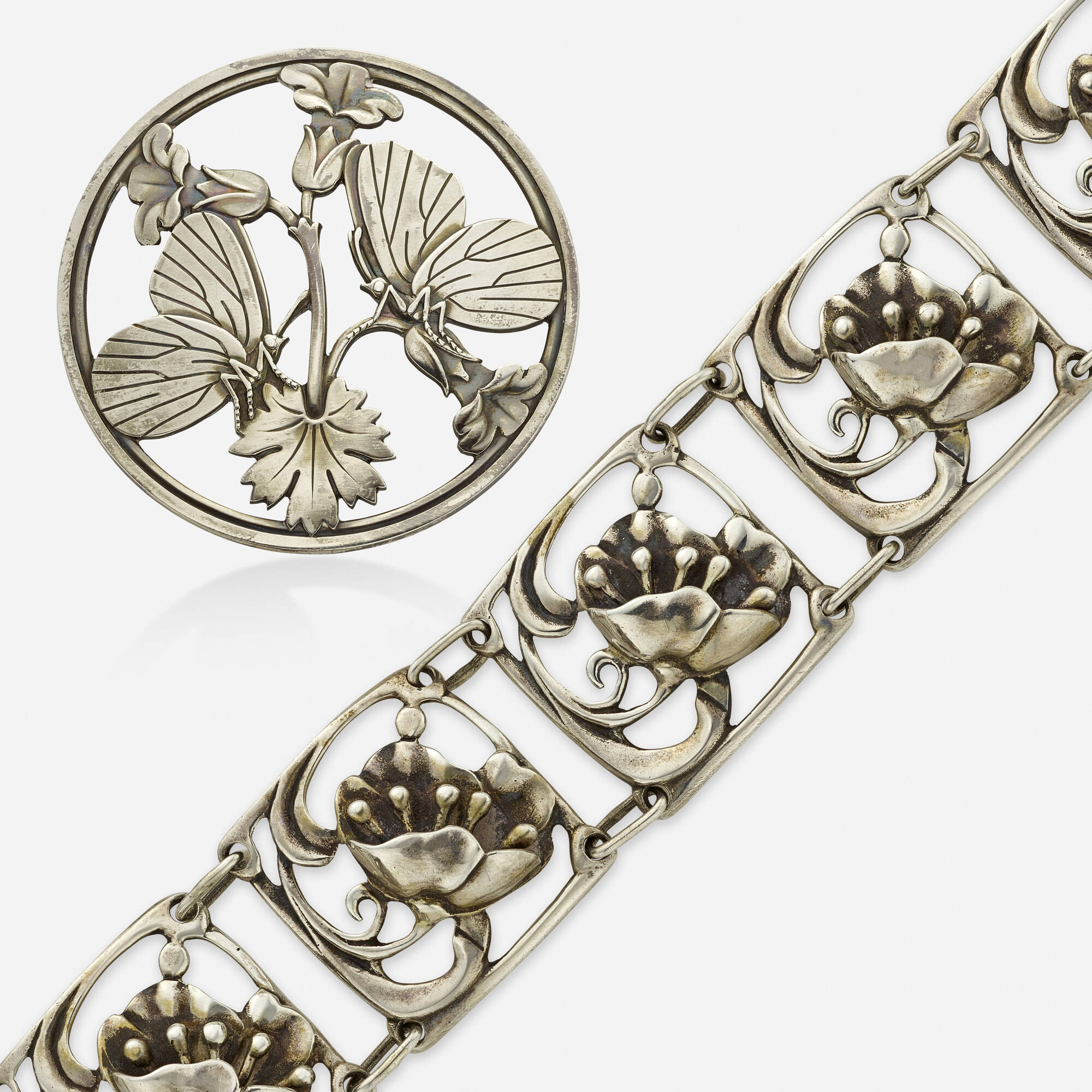 251 GEORG JENSEN Sterling silver brooch with Max Rieg bracelet Jewelry Antique to Art Deco 16 April 2024 Auctions Toomey Co. Auctioneers