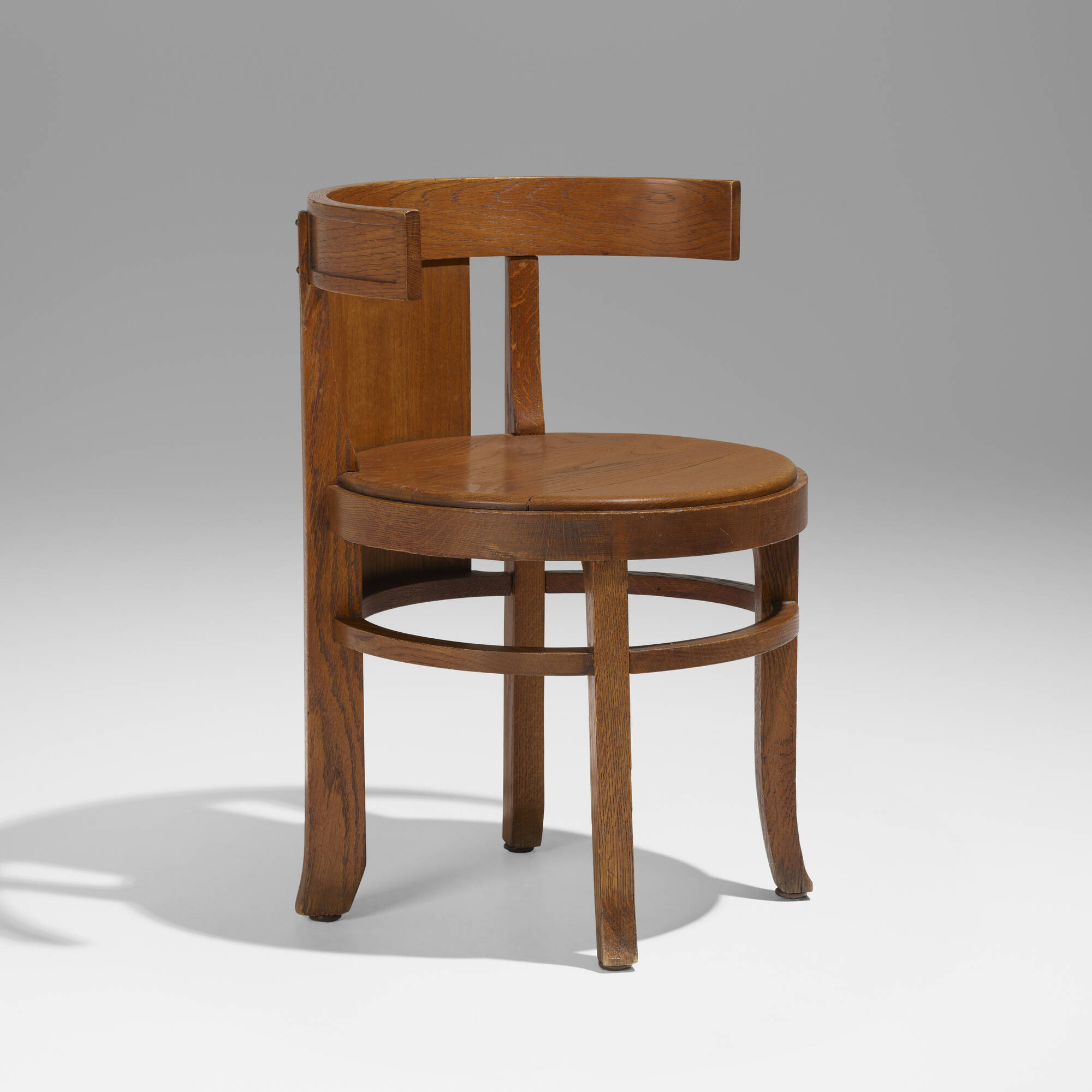 255: FRANK LLOYD WRIGHT, Barrel-back chair from the Frank L