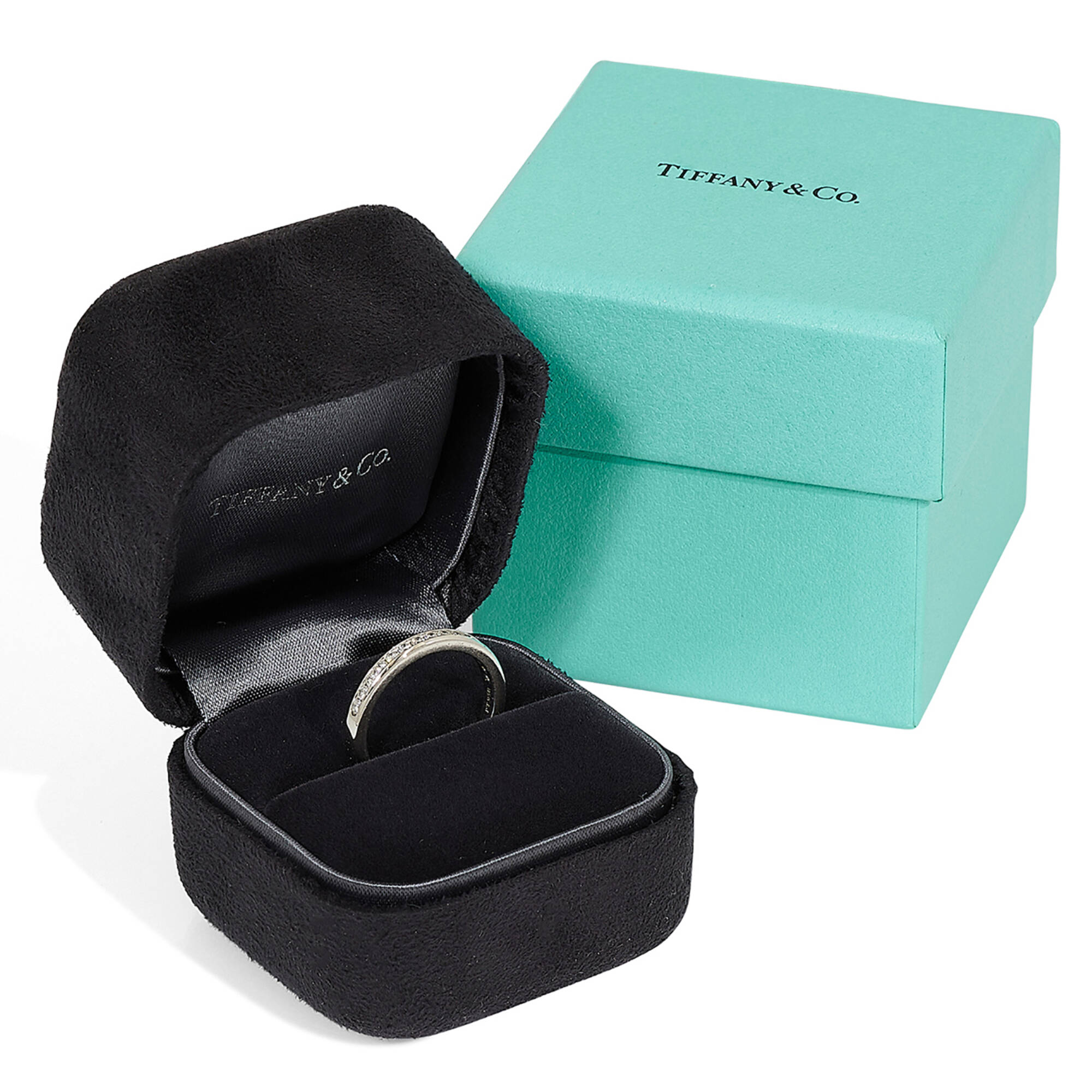 620: TIFFANY & CO., platinum and diamond half eternity ring