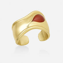 ELSA PERETTI FOR TIFFANY & CO., Gold and carnelian ‘Bone’ cuff bracelet | toomeyco.com